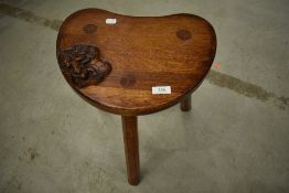 An Arts and Crafts oak stool, Frogman design