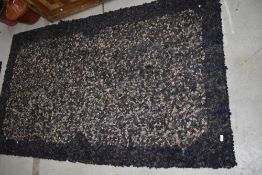 A traditional pegged rag rug, approx. 205 x 125cm