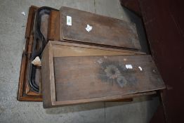 A selection of vintage wooden trays and boxes