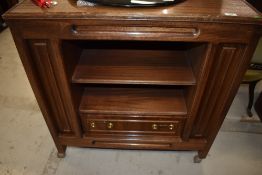 A media centre cabinet having drawers storage and shelf