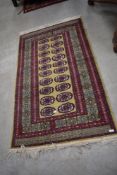 A Persian style rug, approx 162 x 95cm