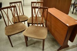 A teak G plan set comprising four chairs and gateleg table