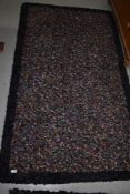 A traditional pegged rag rug, approx. 183 x 104cm