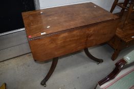 A 19th Century mahogany pembroke style table in the Regency style, width approx. 87cm