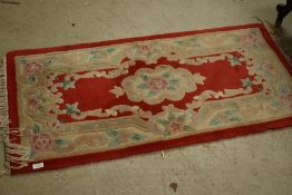 A Chinese fireside rug, approx. 120 x 60cm