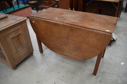 A Victorian mahogany gateleg dining table