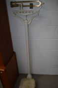 A set of cast iron and brass platform scales, possibly medical related
