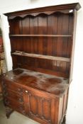 An early 20th Century oak dresser in the Jacobean style, width approx. 107cm
