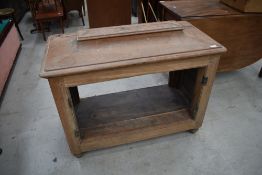 A period style limed oak cabinet, of casket form