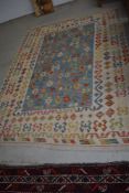 A traditional carpet square, Aztec style pattern, approx. 240 x 180cm