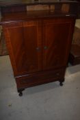 A modern reproduction media centre cabinet