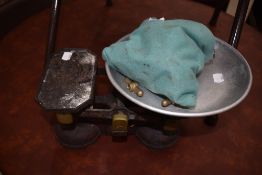 A set of traditional Avery balance scales with weights