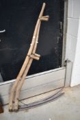 Two traditional bygone scythes