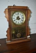 A Victorian oak cased mantel clock
