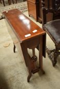 An Edwardian mahogany and inlaid Sutherland style occasional table
