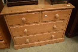 A natural pine chest of two over two drawers, having tongue and groove drawer bases, width approx.