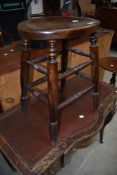 A 19th Century stool having turned frame