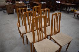 A set of vintage/modern railback dining chairs having upholstered seats (4 plus 2)