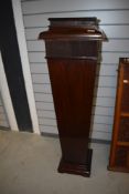 A late Victorian Torchere stand of tapered form with concealed compartment
