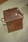 An Art Nouveau/Arts and Crafts copper coal bucket with stylised decoration