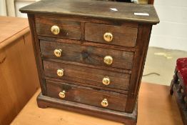 A stained frame specimen chest of two over three drawers, width brass handles, dimensions approx. 37