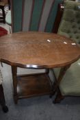A mid 20th Century oak hall table having oval top
