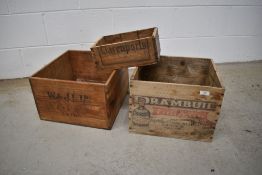 Three vintage wooden liquor crates