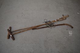 Two vintage polo mallets , horse bits etc