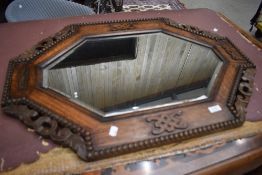 A 19th Century oak canted wall mirror, width approx. 82cm