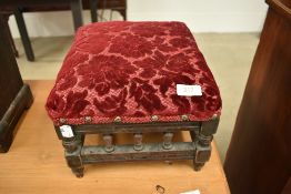 A 19th Century footstool having bobbin spindle decoration