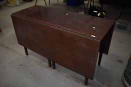 A 19th Century mahogany gateleg dining table, width approx. 129cm