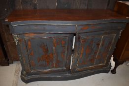 A 19th Century mahogany serpentine front chiffonier having later painted and distressed front