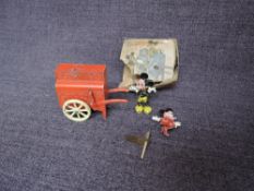 A Salco Series diecast Mickey and Minnie's Barrel Organ with music, red organ in original part box