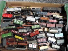 A box containing over 50 00 gauge Wagons including kit built, Hornby Dublo etc