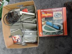 A box containing approx 60 pieces of Triang 00 gauge Platforms and a R414 Operating Turntable