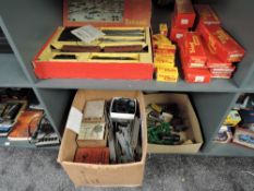 Two shelves of mainly Triang 00 gauge including RO Passenger Train set, boxed track, loose track,