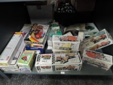 A shelf of mixed vintage toys including eight Kovap (Czech Repubic) models, Zetor Tractor, Fire