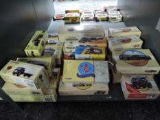 A shelf of Corgi Classics and similar diecast Adverting Vans, Buses, Construction Vehicles etc,