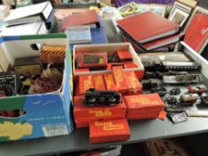 A collection of Triang 00 gauge including 0-6-0 Saddle Tank Loco R153, Carriages and Rolling Stock