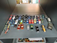 A shelf of mainly Corgi playworn diecasts including Racing Cars, Military, Saloons, etc also a