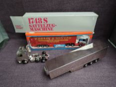 A Tekno 150 scale diecast Articulated Wagon, T Brady & Son Ltd, boxed along with a NZG 1:50 scale