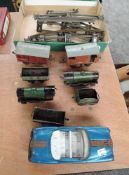 A small collection of Hornby 0 gauge including 2 0-4-0 clockwork Loco's, Rolling stock and track