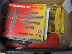 A box containing two boxed Fleishmann Point Sets, four 00 gauge Gem Point Sets and a boxed Hornby
