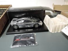 A Gwilo International Limited 118 scale diecast model, F1 McLaren 1993 Sports Car, on plastic