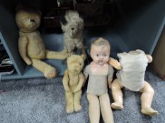 Two mid 20th century straw filled Teddy Bears both jointed with stitched noses, a similar period