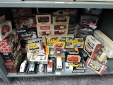 A collection of modern Vanguards, Lledo, Dinky, Corgi and similar diecasts including Police Cars,
