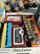 A box of Dapol, Hornby and similar 00 gauge GWR items, two Loco's, 4 Coaches Wagons etc, most boxed