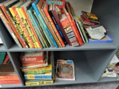 Two shelves of mixed vintage Children's Annuals and Story Books including Dandy, Victor, Topper,