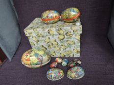 A small collection of mid 20th century card eggs including GDR, Western Germany, German Democratic