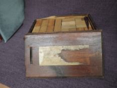 A pine painted box containing vintage Oak Building Blocks supplied by Burt & Son